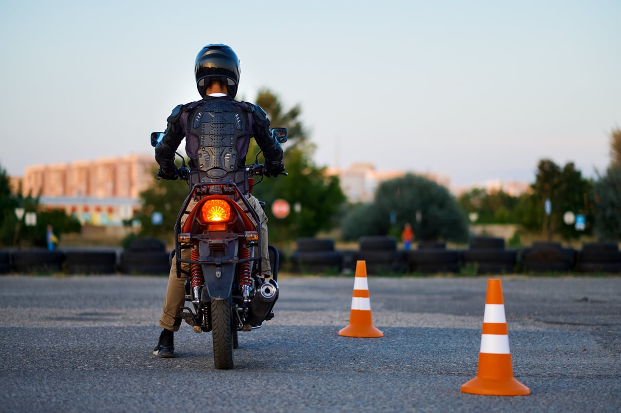 Student on Motorbike, Back View, Motorcycle School